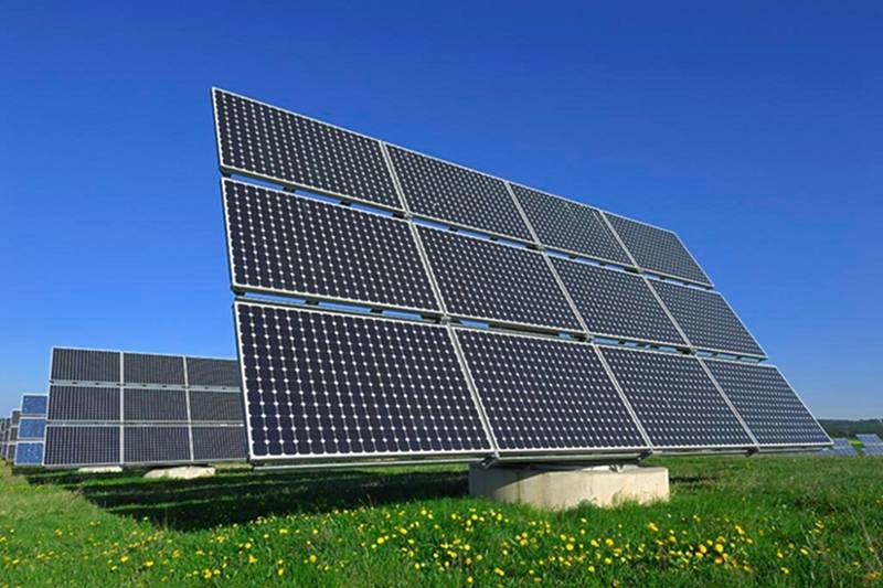 Modern commercial building with extensive solar panel array